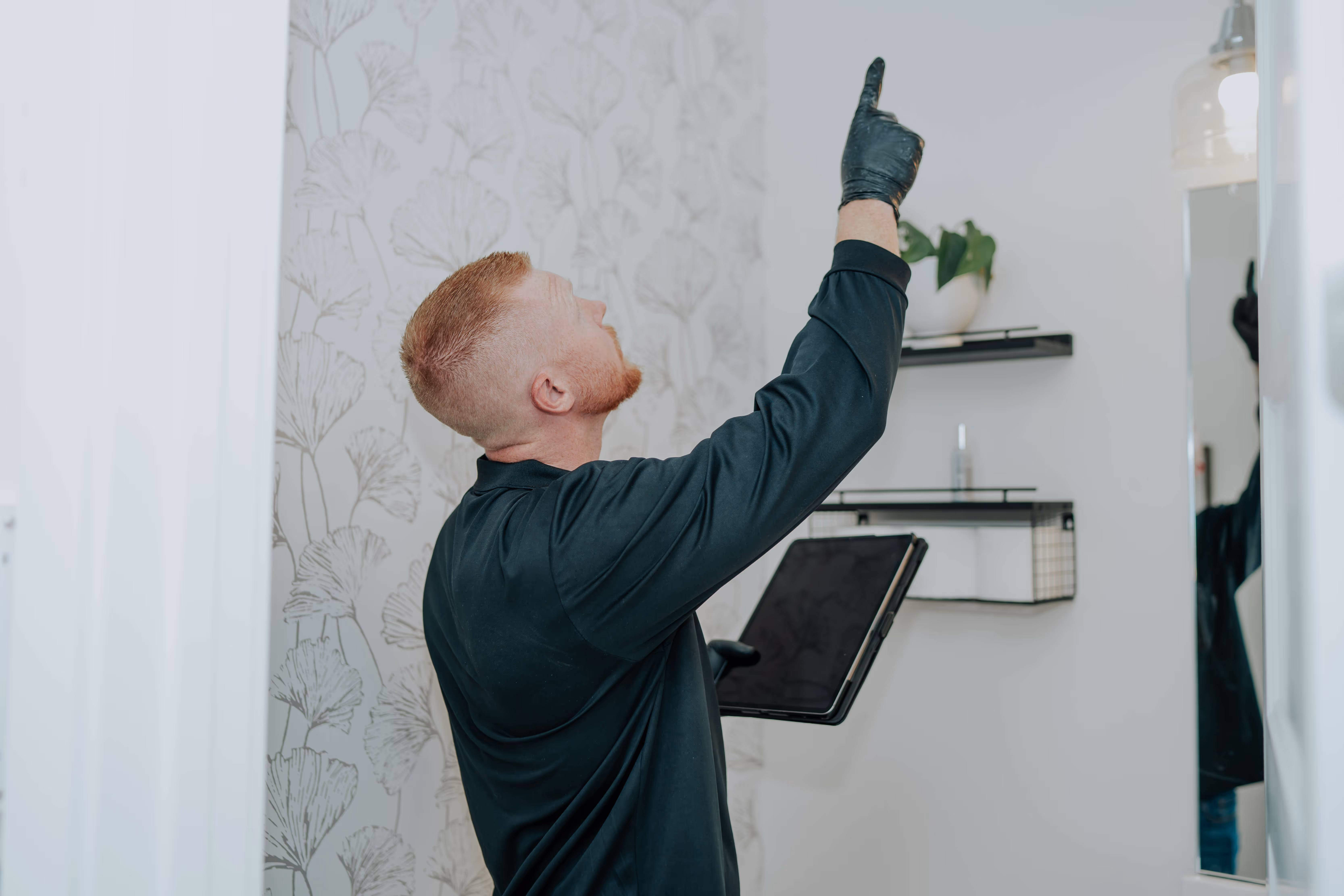 Pure Maintenance of Utah technician conducting a full property mold inspection